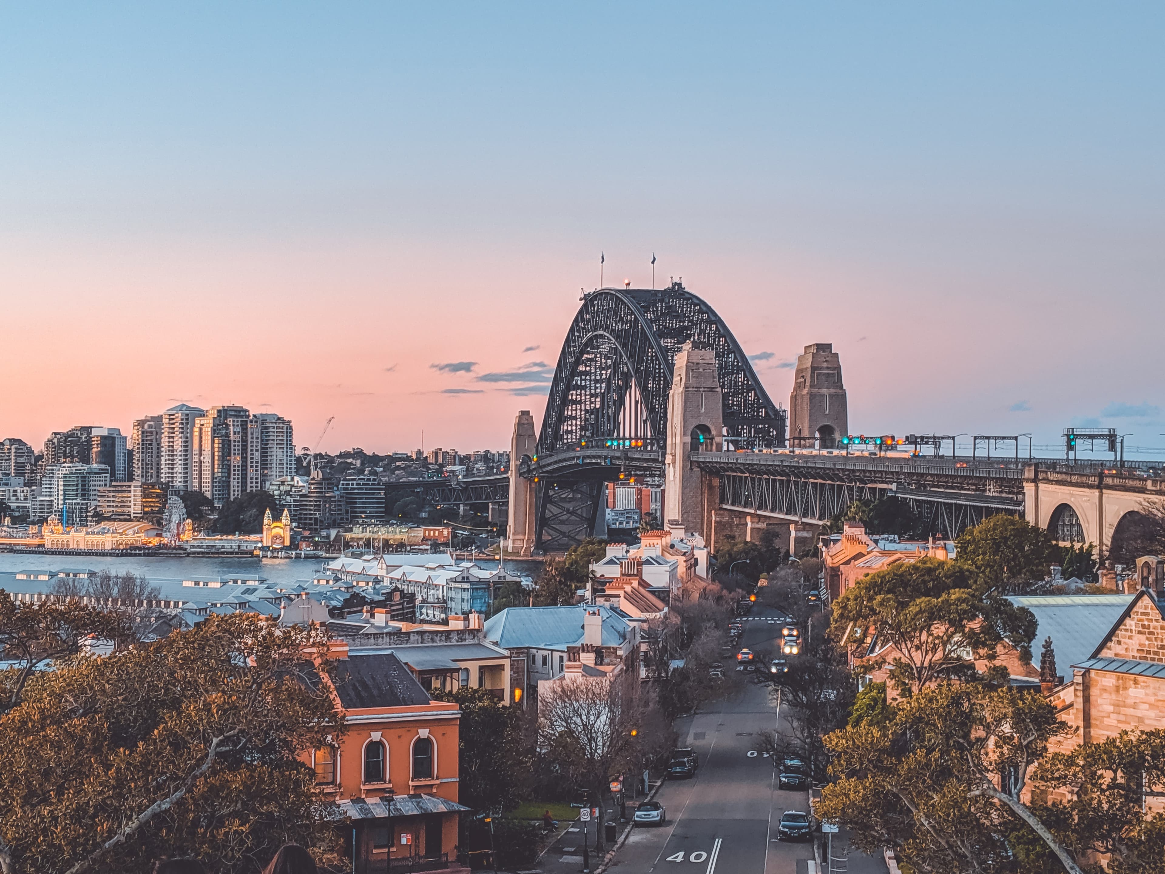 Sydney Harbour Bridge above The Rocks at sunset